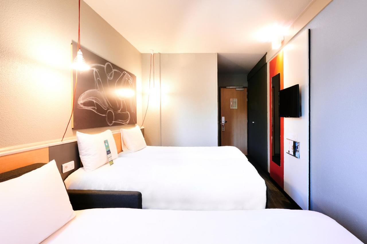 Superior Kamer met 1 Tweepersoonsbed en een Bank.